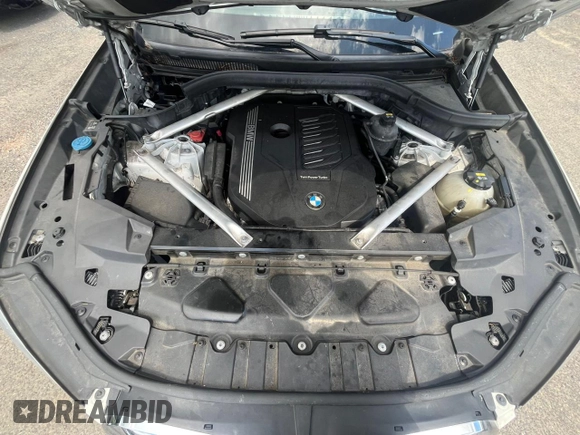 2019 BMW X5 xDrive40i with VIN 5UXCR6C55KLK80009, listed as a Copart auction lot 66447745 with 98,821 mi miles and Clean title. Bid and sale history available at DreamBid. Image 6.