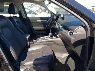 2021 Mazda CX-5 Touring with VIN JM3KFACM2M0339349, listed as a IAAI auction lot 41651005 with 53,792 mi miles. Bid and sale history available at carsss.com. Image 5.