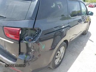 2020 Kia Sedona EX with VIN KNDMB5C14L6596843, listed as a IAAI auction lot 42074858 with 82,294 mi miles. Bid and sale history available at carsss.com. Image 4.