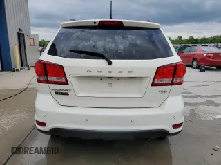2014 Dodge Journey R/T with VIN 3C4PDCEG0ET309861, listed as a Copart auction lot 55318185 with 185,526 mi miles and Salvage title. Bid and sale history available at DreamBid. Image 6.