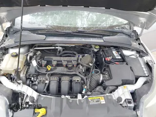 2014 Ford Focus Titanium with VIN 1FADP3J20EL148417, listed as a IAAI auction lot 41954291 with 120,098 mi miles. Bid and sale history available at carsss.com. Image 10.