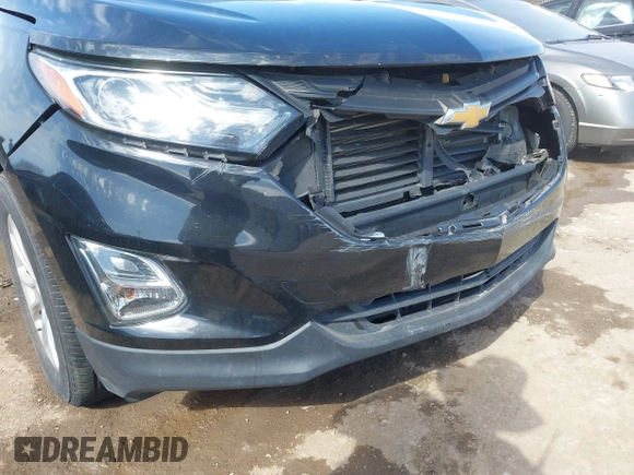 2019 Chevrolet Equinox LT z VIN 3GNAXUEV0KL216360, wystawiony jako IAAI lot #41664268 z przebiegiem 69 411 mil mil oraz . Historia ofert i sprzedaży dostępna na DreamBid. Obrazek 6.