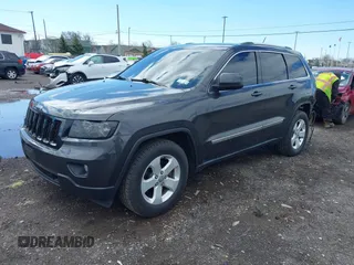 2011 Jeep Grand Cherokee Laredo with VIN 1J4RR4GG9BC723395, listed as a IAAI auction lot 42092022 with 86,226 mi miles and . Bid and sale history available at DreamBid. Image 17.