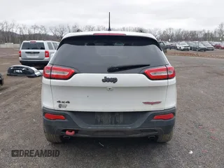 2016 Jeep Cherokee Trailhawk with VIN 1C4PJMBS7GW241076, listed as a IAAI auction lot 42020124 with 151,742 mi miles and . Bid and sale history available at DreamBid. Image 16.
