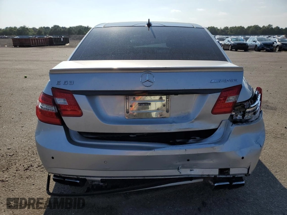 2010 Mercedes-Benz E 63 AMG with VIN WDDHF7HBXAA149436, listed as a Copart auction lot 68736984 with 112,176 mi miles and Salvage title. Bid and sale history available at DreamBid. Image 6.