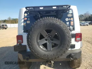 2013 Jeep Wrangler Rubicon with VIN 1C4BJWCG3DL590006, listed as a Copart auction lot 85855594 with 99,218 mi miles and Salvage title. Bid and sale history available at DreamBid. Image 6.
