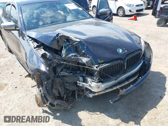 2019 BMW 5 Series M550i xDrive with VIN WBAJB9C51KB288853, listed as a IAAI auction lot 41905019 with Not provided miles and . Bid and sale history available at DreamBid. Image 6.