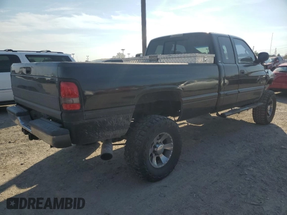 2001 Dodge Ram 2500 with VIN 3B7KF23651G821045, listed as a Copart auction lot 78208214 with 300,131 mi miles and Salvage Title. Bid and sale history available at carsss.com. Image 3.