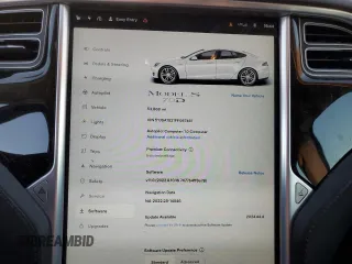 2015 Tesla Model S 85D with VIN 5YJSA1S21FF087461, listed as a Copart auction lot 87027334 with 53,868 mi miles and Salvage Title. Bid and sale history available at carsss.com. Image 9.