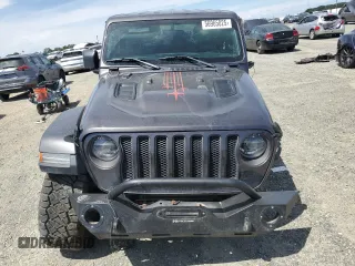 2020 Jeep Wrangler Rubicon z VIN 1C4HJXCG6LW242469, wystawiony jako Copart lot #56965025 z przebiegiem Nie podano mil oraz Szkoda całkowita • Salvage title. Historia ofert i sprzedaży dostępna na DreamBid. Obrazek 5.