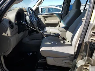 2005 Jeep Liberty Sport with VIN 1J4GK48K55W585730, listed as a Copart auction lot 48254745 with 173,010 mi miles and Clean Title. Bid and sale history available at carsss.com. Image 7.