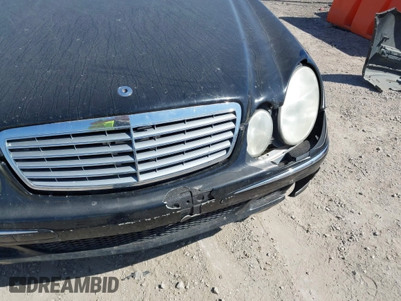 2006 Mercedes-Benz E-Class 3.5L with VIN WDBUF56J46A884099, listed as a IAAI auction lot 41798143 with 175,597 mi miles. Bid and sale history available at carsss.com. Image 6.