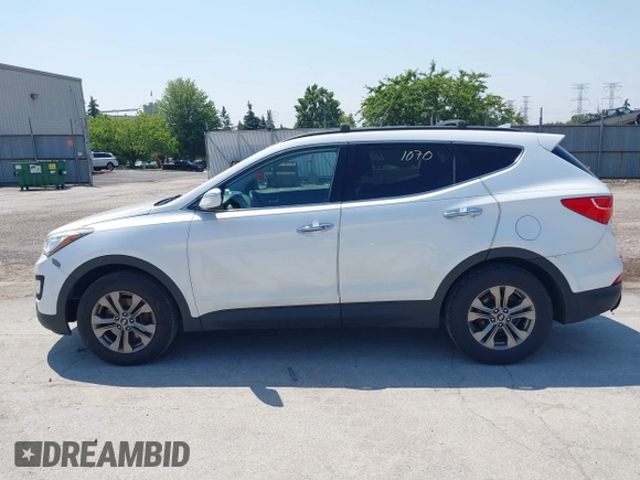 2014 Hyundai Santa Fe with VIN 5XYZUDLB9EG156555, listed as a IAAI auction lot 42721070 with 349,412 mi miles and . Bid and sale history available at DreamBid. Image 14.