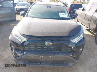 2021 Toyota RAV4 Hybrid XLE with VIN 4T3RWRFV5MU012238, listed as a IAAI auction lot 41943154 with 72,316 mi miles. Bid and sale history available at carsss.com. Image 6.