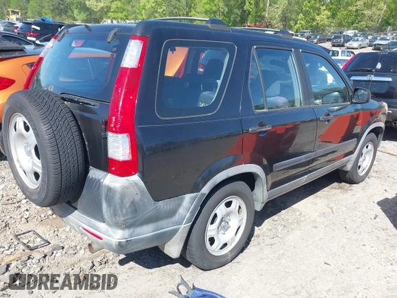 2006 Honda CR-V LX with VIN JHLRD68586C009537, listed as a IAAI auction lot 42029852 with 160,311 mi miles and . Bid and sale history available at DreamBid. Image 4.