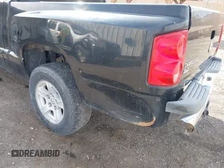 2006 Dodge Dakota SLT with VIN 1D7HE48NX6S596684, listed as a IAAI auction lot 41992956 with 255,526 mi miles and . Bid and sale history available at carsss.com. Image 6.