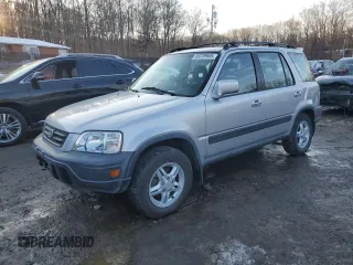 1999 Honda CR-V EX with VIN JHLRD1767XC030653, listed as a Copart auction lot 89239985 with 205,294 mi miles and Salvage Title. Bid and sale history available at carsss.com. Image 1.