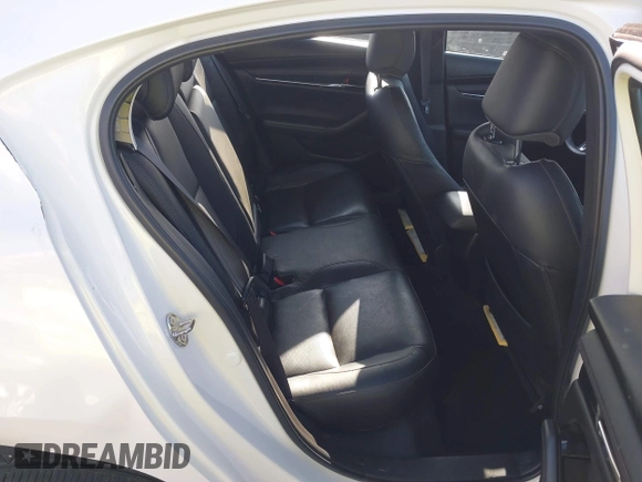 2020 Mazda 3 Premium with VIN 3MZBPAEM3LM132772, listed as a IAAI auction lot 42067269 with 53,751 mi miles and . Bid and sale history available at DreamBid. Image 8.