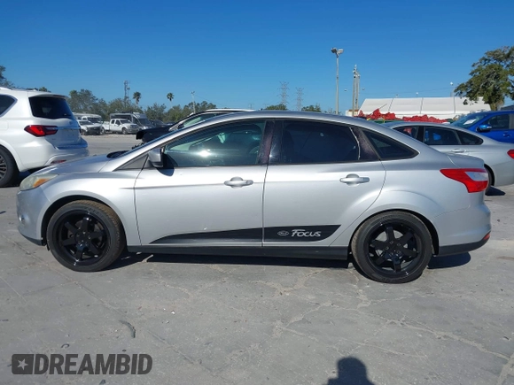2012 Ford Focus SE with VIN 1FAHP3F23CL265724, listed as a IAAI auction lot 41184121 with 216,873 mi miles. Bid and sale history available at carsss.com. Image 14.