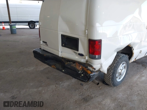 2012 Ford Econoline Cargo Commercial with VIN 1FTNE1EW3CDA31914, listed as a IAAI auction lot 41622154 with 99,254 mi miles and . Bid and sale history available at carsss.com. Image 6.