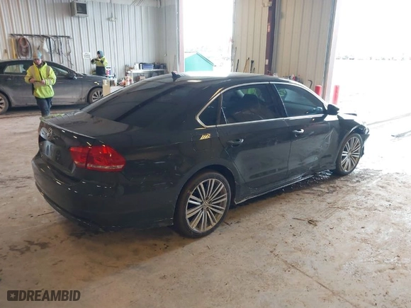 2015 Volkswagen Passat 1.8T SE w/Sunroof & Nav with VIN 1VWBT7A35FC088243, listed as a IAAI auction lot 41638900 with 82,840 mi miles. Bid and sale history available at carsss.com. Image 4.