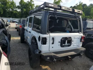 2018 Jeep Wrangler Unlimited Sport S with VIN 1C4HJXDGXJW130690, listed as a Copart auction lot 46921725 with 107,616 mi miles and Salvage title. Bid and sale history available at DreamBid. Image 2.