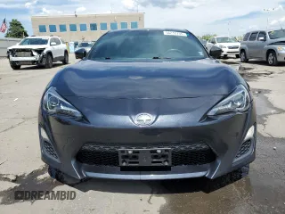 2015 Scion FR-S z VIN JF1ZNAA12F8707784, wystawiony jako Copart lot #56248735 z przebiegiem 119 679 mil mil oraz Szkoda całkowita • Salvage title. Historia ofert i sprzedaży dostępna na DreamBid. Obrazek 5.