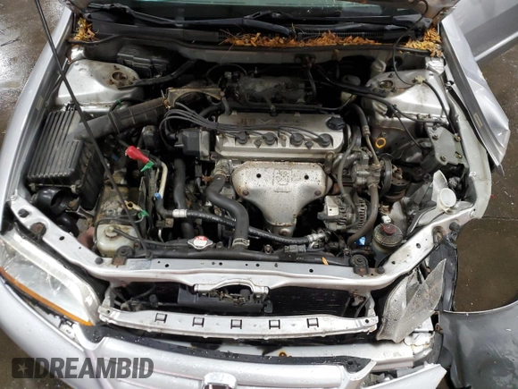 2001 Honda Accord LX z VIN JHMCG55401C011175, wystawiony jako Copart lot #88027405 z przebiegiem 143 973 mil mil oraz Szkoda całkowita • Salvage title. Historia ofert i sprzedaży dostępna na DreamBid. Obrazek 11.