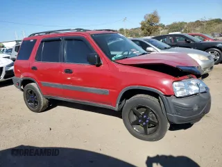 1997 Honda CR-V with VIN JHLRD1843VC018932, listed as a Copart auction lot 77965544 with 204,861 mi miles and Salvage Title. Bid and sale history available at carsss.com. Image 4.