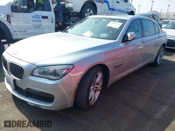 2015 BMW 7 Series 750Li with VIN WBAYE8C5XFD782039, listed as a IAAI auction lot 41505626 with 74,716 mi miles. Bid and sale history available at carsss.com. Image 19.