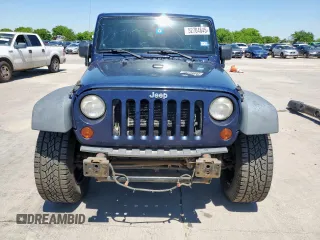 2013 Jeep Wrangler Unlimited Sport with VIN 1C4HJWDG2DL620654, listed as a Copart auction lot 52704645 with 133,932 mi miles and Clean title. Bid and sale history available at DreamBid. Image 5.