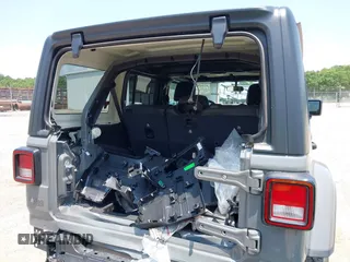 2023 Jeep Wrangler Sport Altitude с VIN 1C4HJXDG6PW576179, выставлен на аукционе IAAI как лот 42345627 с пробегом 20 112 миль миль и . История ставок и продаж доступна на DreamBid. Изображение 6.