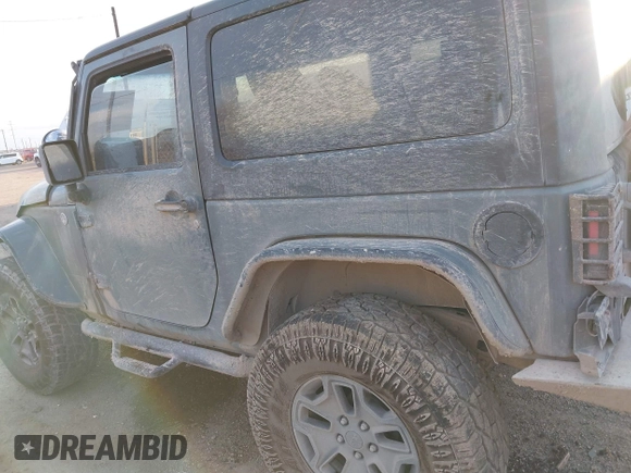 2014 Jeep Wrangler Sport with VIN 1C4AJWAG0EL326774, listed as a IAAI auction lot 41691784 with 98,696 mi miles and . Bid and sale history available at DreamBid. Image 15.