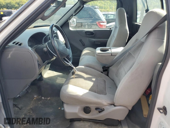 2003 Ford F-150 XL with VIN 1FTRF17L83NB79035, listed as a Copart auction lot 72051234 with Not Provided miles and Salvage Title. Bid and sale history available at DreamBid. Image 7.