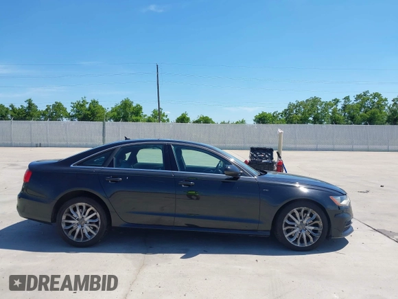 2014 Audi A6 Prestige with VIN WAUHMAFC8EN081609, listed as a IAAI auction lot 42252900 with 170,222 mi miles and . Bid and sale history available at DreamBid. Image 13.