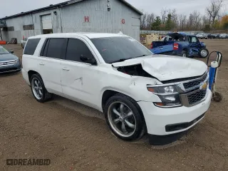 2016 Chevrolet Tahoe Commercial with VIN 1GNSKDEC7GR148947, listed as a Copart auction lot 77437274 with 241,879 mi miles and Clean Title. Bid and sale history available at carsss.com. Image 4.
