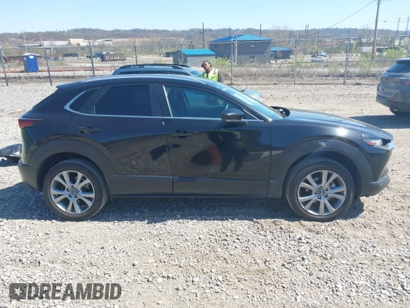 2023 Mazda CX-30 S Carbon Edition with VIN 3MVDMBCM1PM509987, listed as a IAAI auction lot 42060833 with 14,140 mi miles and . Bid and sale history available at DreamBid. Image 13.