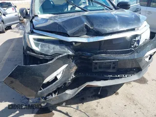 2016 Honda Pilot EX-L with VIN 5FNYF6H53GB048317, listed as a IAAI auction lot 41826297 with 127,672 mi miles. Bid and sale history available at carsss.com. Image 6.