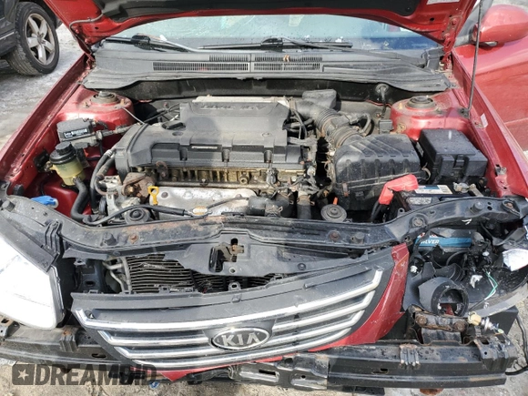 2009 Kia Spectra SX with VIN KNAFE222495661159, listed as a Copart auction lot 42604295 with 123,934 mi miles and Salvage Title. Bid and sale history available at carsss.com. Image 11.