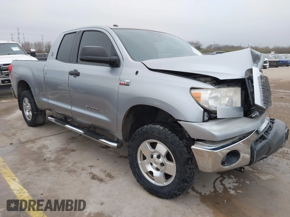 2012 Toyota Tundra z VIN 5TFRY5F18CX121917, wystawiony jako IAAI lot #41475681 z przebiegiem 166 507 mil mil oraz . Historia ofert i sprzedaży dostępna na DreamBid. Obrazek 1.