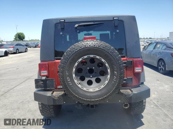 2009 Jeep Wrangler Rubicon with VIN 1J4GA64169L764202, listed as a Copart auction lot 58241585 with 69,189 mi miles and Clean title. Bid and sale history available at DreamBid. Image 6.