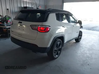 2018 Jeep Compass Altitude with VIN 3C4NJDBB4JT395992, listed as a IAAI auction lot 41318649 with 88,887 mi miles and . Bid and sale history available at carsss.com. Image 4.