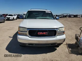 2001 GMC Yukon SLT z VIN 1GKEC13T81J152049, wystawiony jako Copart lot #56494675 z przebiegiem 160 102 mil mil oraz Szkoda całkowita • Salvage title. Historia ofert i sprzedaży dostępna na DreamBid. Obrazek 5.