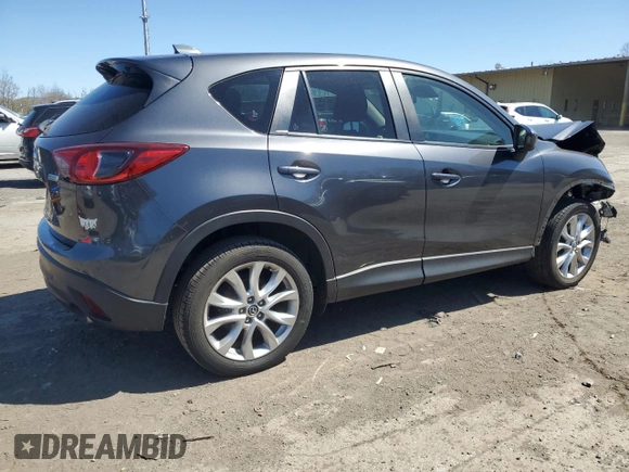 2014 Mazda CX-5 Grand Touring with VIN JM3KE4DY4E0422739, listed as a Copart auction lot 53234745 with 54,152 mi miles and Salvage Title. Bid and sale history available at carsss.com. Image 3.