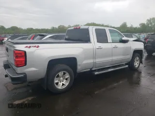 2018 Chevrolet Silverado 1500 LT with VIN 1GCVKREH8JZ102484, listed as a Copart auction lot 55114225 with 59,185 mi miles and Salvage Title. Bid and sale history available at DreamBid. Image 3.