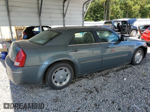 2005 Chrysler 300 Touring z VIN 2C3JA53G65H574021, wystawiony jako Copart lot #70073414 z przebiegiem 291 219 mil mil oraz Szkoda całkowita • Salvage title. Historia ofert i sprzedaży dostępna na DreamBid. Obrazek 3.