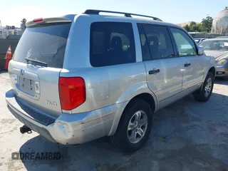 2005 Honda Pilot EX-L z VIN 2HKYF18695H545804, wystawiony jako IAAI lot #42354721 z przebiegiem 228 914 mil mil oraz . Historia ofert i sprzedaży dostępna na DreamBid. Obrazek 4.