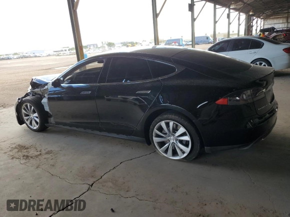 2014 Tesla Model S 60 z VIN 5YJSA1H11EFP36480, wystawiony jako Copart lot #71210254 z przebiegiem 121 014 mil mil oraz Szkoda całkowita • Salvage title. Historia ofert i sprzedaży dostępna na DreamBid. Obrazek 2.