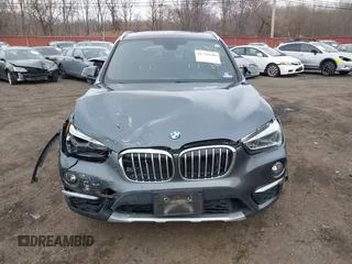 2017 BMW X1 xDrive28i with VIN WBXHT3C35H5F74213, listed as a IAAI auction lot 41589180 with 58,990 mi miles. Bid and sale history available at carsss.com. Image 11.