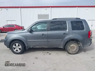 2011 Honda Pilot EX-L with VIN 5FNYF4H59BB042308, listed as a IAAI auction lot 41635511 with 196,736 mi miles and . Bid and sale history available at carsss.com. Image 14.